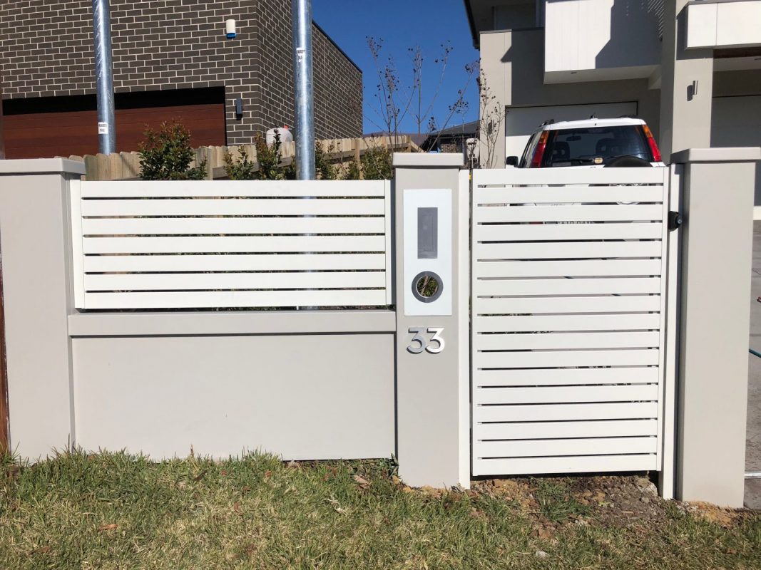 Gates in white for frontyard entrance by master groups